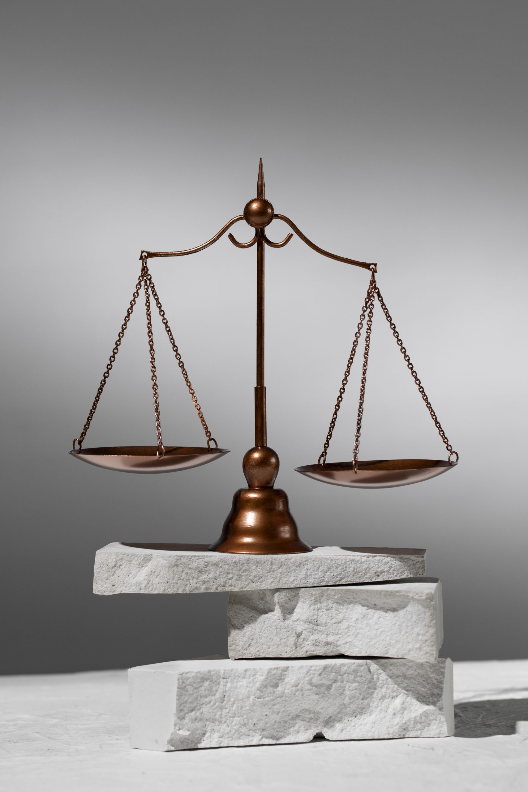 https://bttlawyers.com/wp-content/uploads/2025/01/still-life-with-scales-justice-1-scaled.jpg